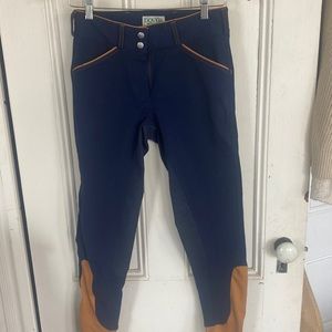 Dover Saddlery Wellesley full seat navy and tan breeches with sock bottoms. 26